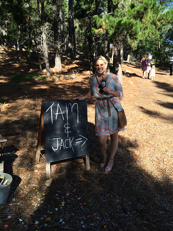 Amy and the sign at Tam's wedding